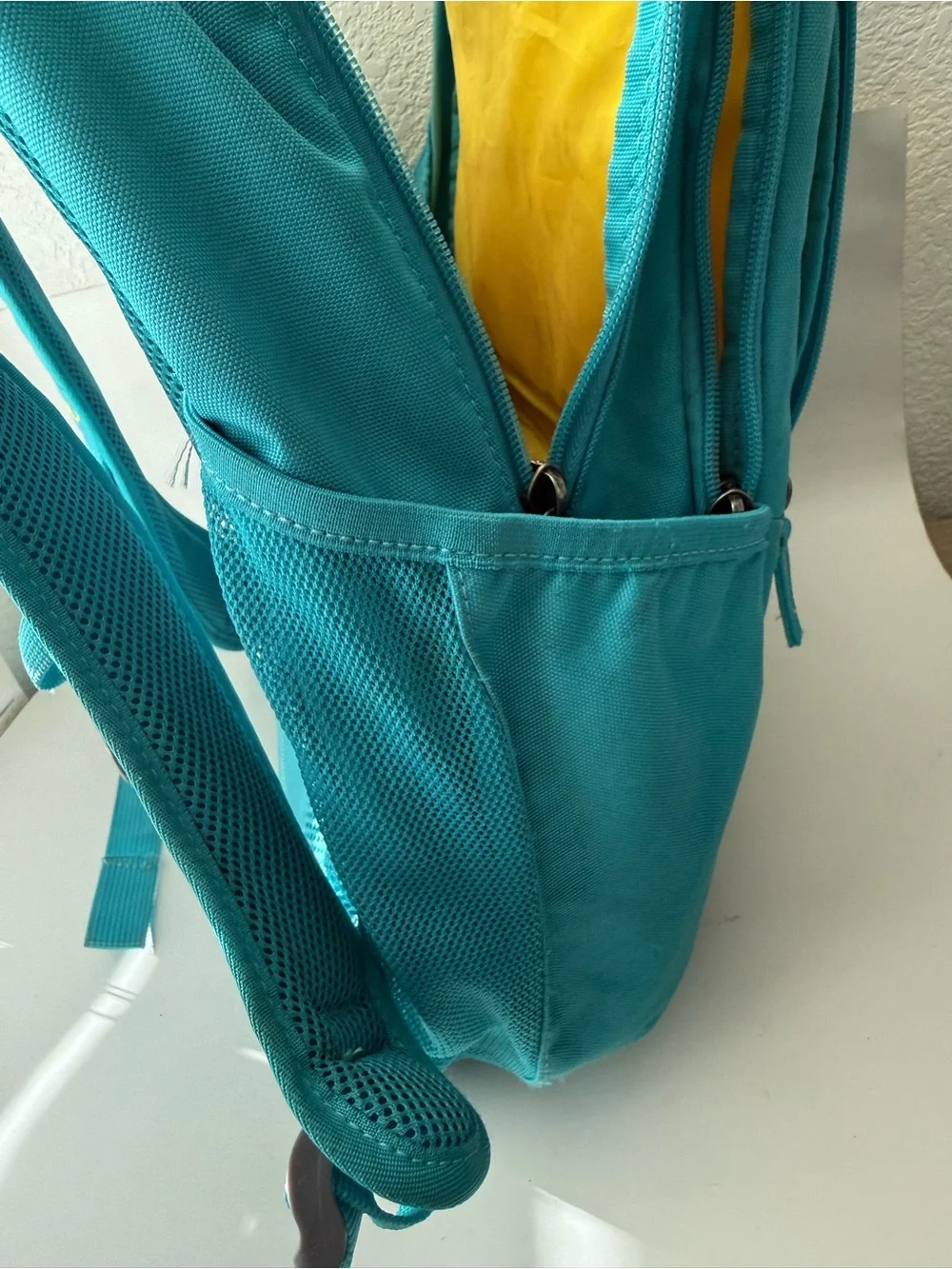 OGIO Aqua Blue Backpack with Yellow Logo